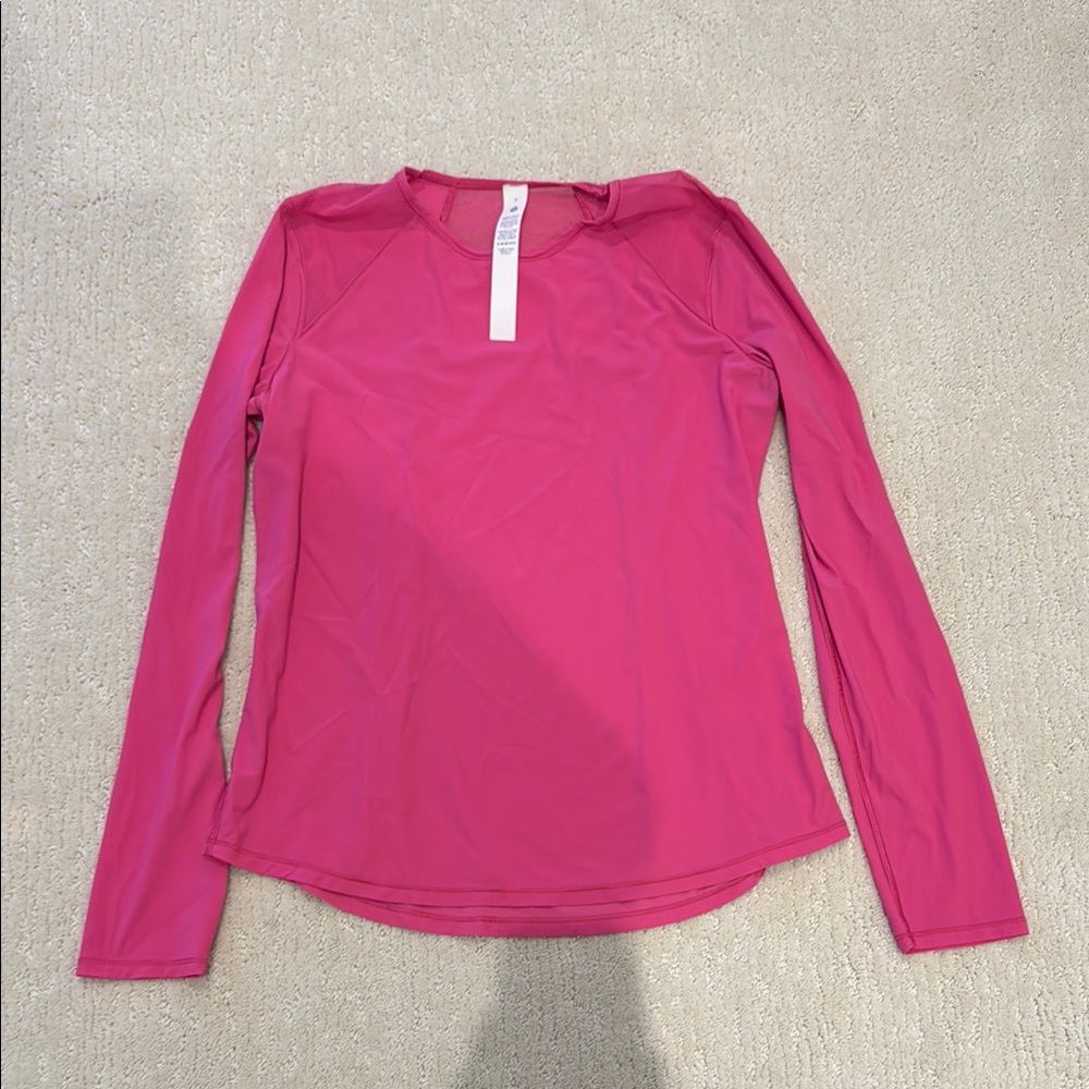 Lululemon pink long sleeve shirt with sheer details. Worn once. Size 8.